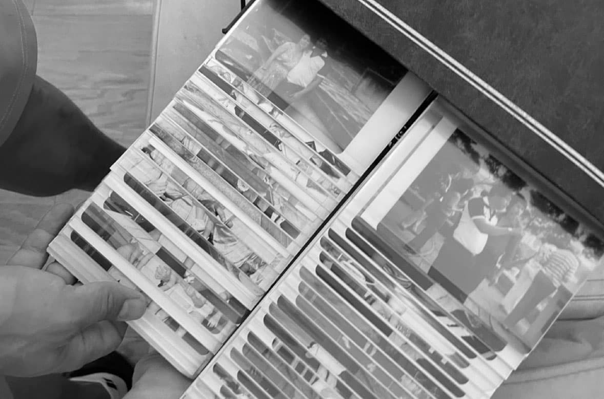 Old photo album with family photos from decades past